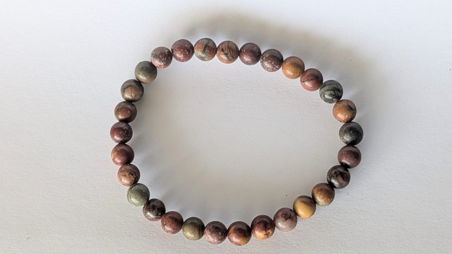 BRACELET EN JASPE POLYCHROME – Perles 6 mm – Artisanat de Madagascar Pierre de force & stabilité | Couleurs naturelles multitonales | Bracelet élastique fait main