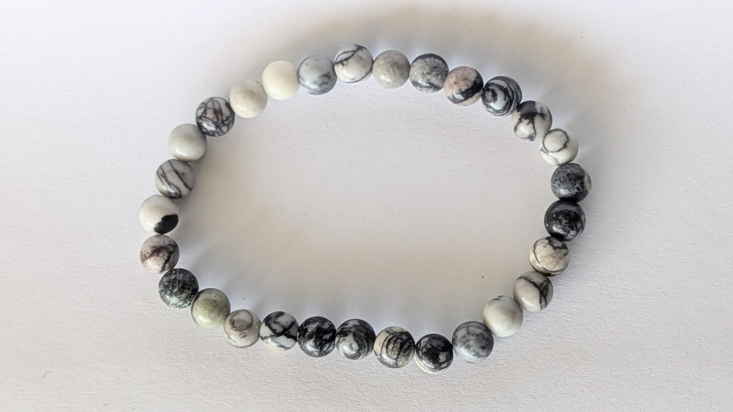 BRACELET EN OBSIDIENNE NEIGE – Perles 6 mm – Artisanat de Madagascar Pierre d’équilibre & protection douce | Noir moucheté naturel | Bracelet élastique fait main