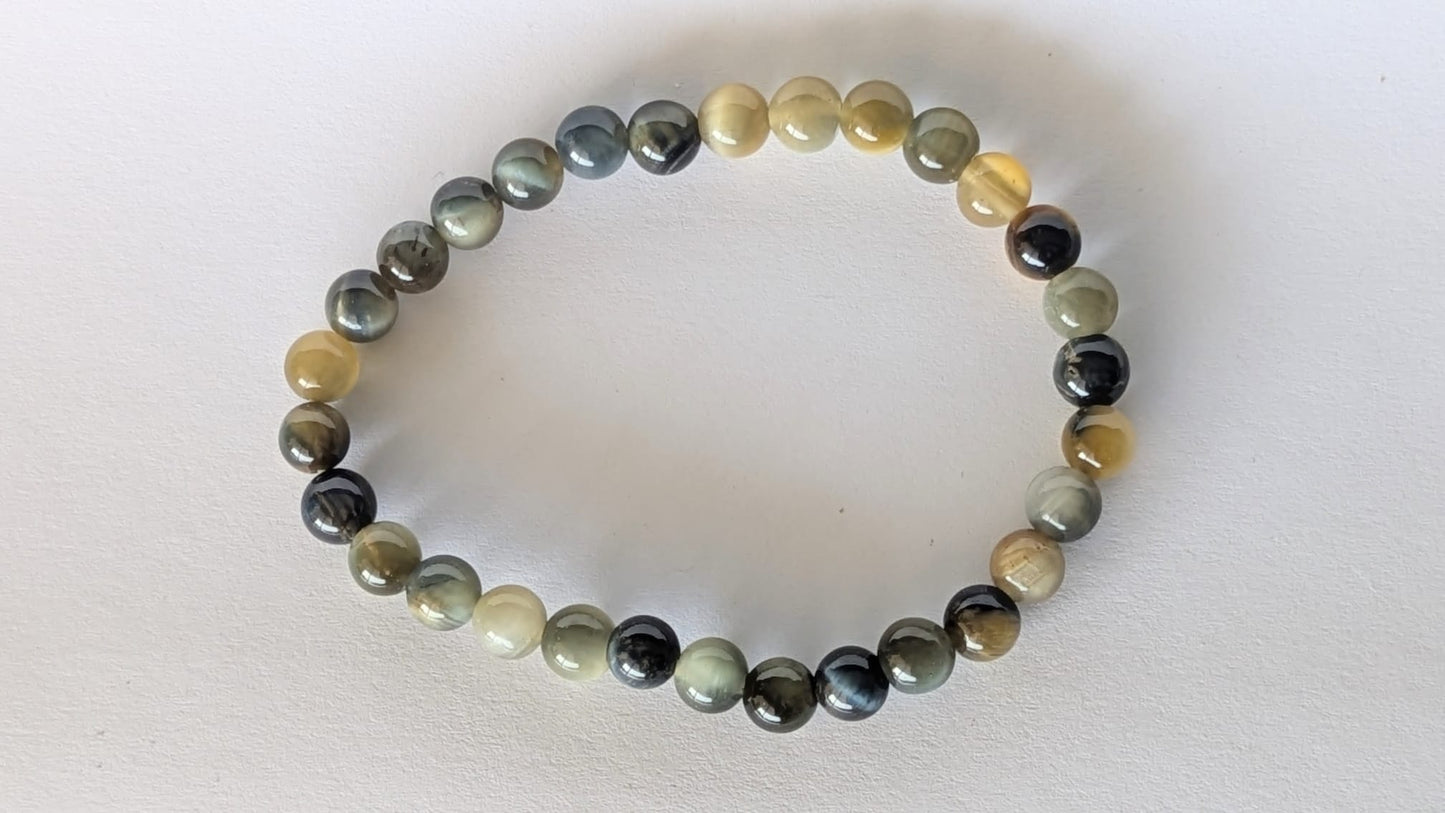 BRACELET EN ŒIL DE TIGRE BLOND – Perles 6 mm – Artisanat de Madagascar Pierre de confiance & énergie solaire | Reflets dorés lumineux | Bracelet élastique fait main