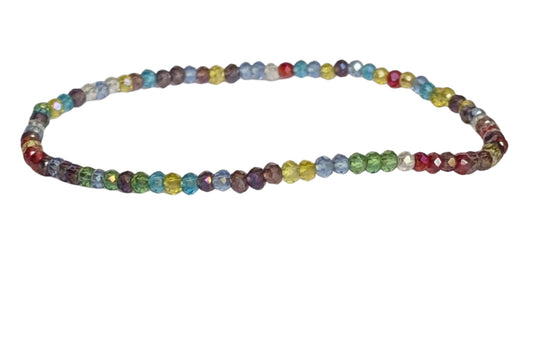 BRACELET EN CRISTAL SWAROVSKI FACETÉ – Perles 2 mm – Artisanat de Madagascar Éclat luxueux & élégance intemporelle | Cristal haute brillance | Bracelet élastique fait main