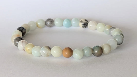 BRACELET EN AMAZONITE COOL – Perles 6 mm – Artisanat de Madagascar Pierre d’apaisement & expression | Bleu‑vert naturel | Bracelet élastique fait main