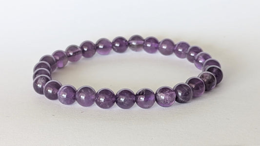 BRACELET EN AMÉTHYSTE – Perles 6 mm – Artisanat de Madagascar Pierre de sagesse & apaisement | Violet naturel profond | Bracelet élastique fait main