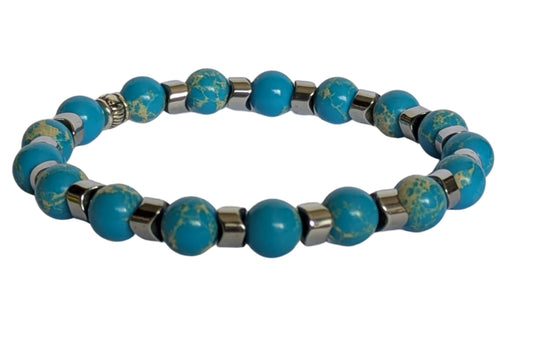 BRACELET DECORE EN JASPE BLEU – Perles 8 mm et strass– Artisanat de Madagascar Pierre de calme & clarté | Bleu naturel veiné | Bracelet élastique fait main
