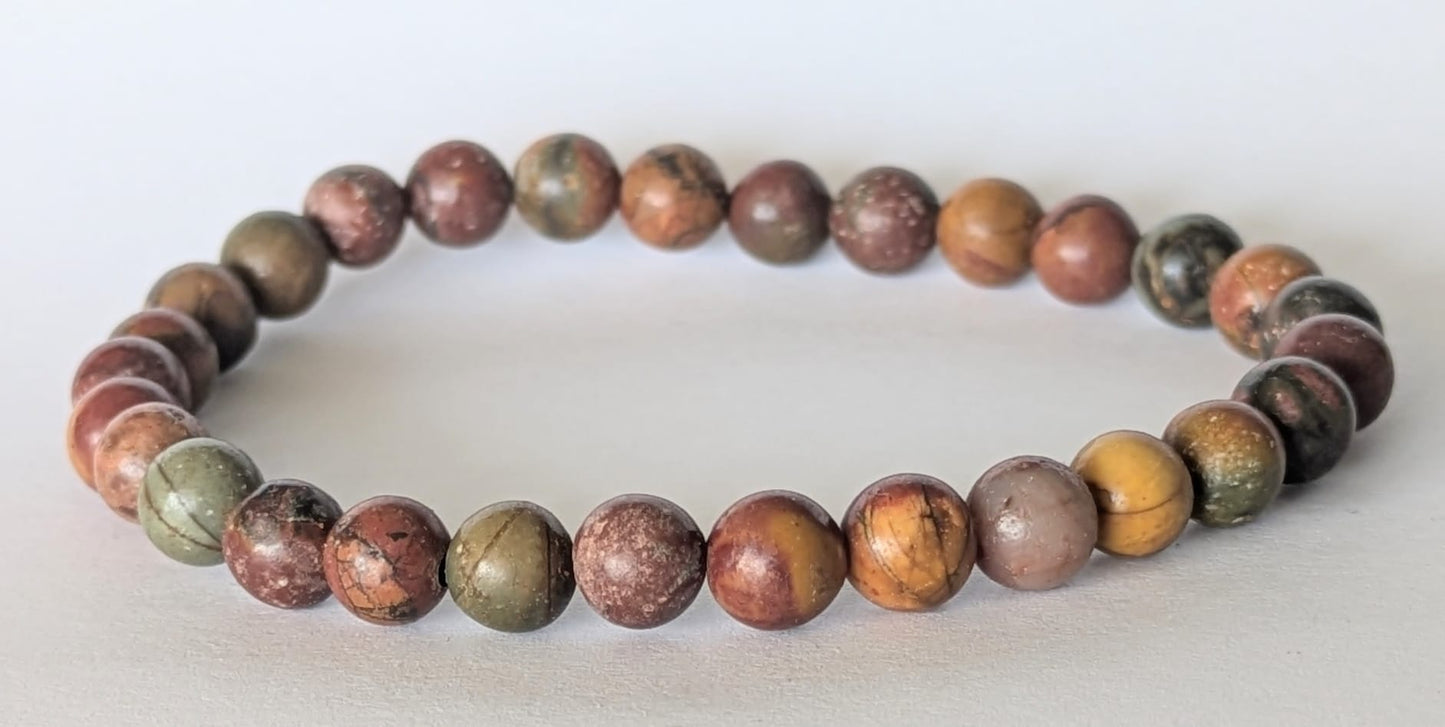 BRACELET EN JASPE POLYCHROME – Perles 6 mm – Artisanat de Madagascar Pierre de force & stabilité | Couleurs naturelles multitonales | Bracelet élastique fait main