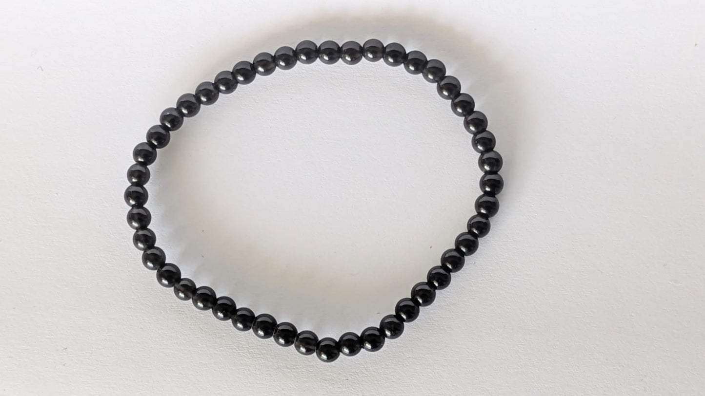 BRACELET EN OBSIDIENNE – Perles 4 mm – Artisanat de Madagascar Pierre de protection & transformation intérieure | Reflets dorés naturels | Bracelet élastique fait main
