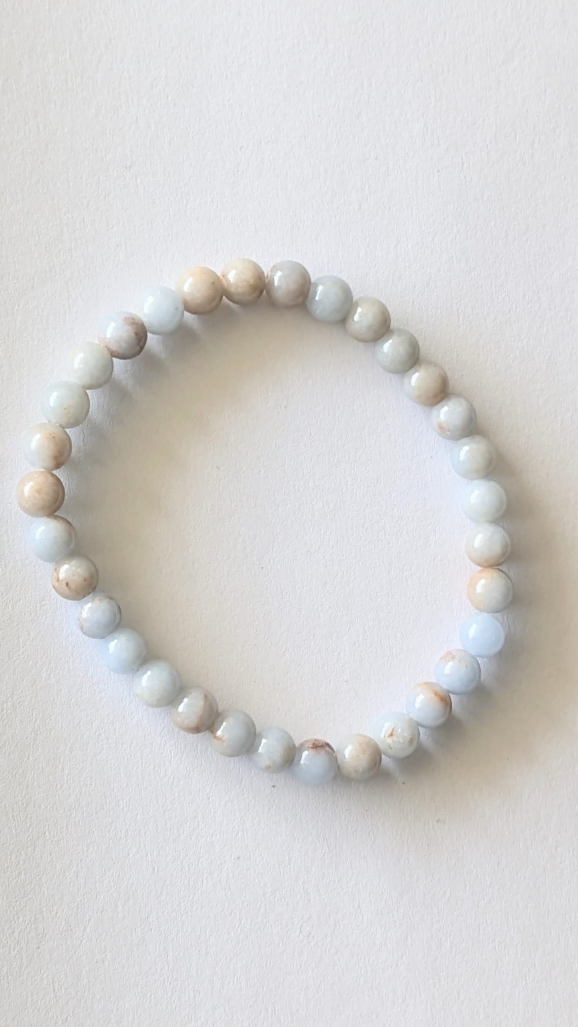 BRACELET EN QUARTZ LAVANDE – Perles 6 mm – Artisanat de Madagascar Pierre de douceur & apaisement émotionnel | Rose‑violet translucide | Bracelet élastique fait main
