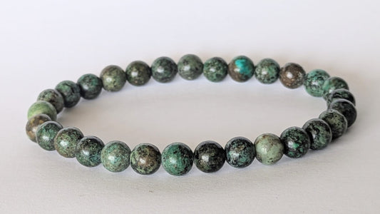BRACELET EN TURQUOISE AFRICAINE – Perles 6 mm – Artisanat de Madagascar Pierre d’évolution & équilibre intérieur | Vert‑bleu moucheté | Bracelet élastique fait main